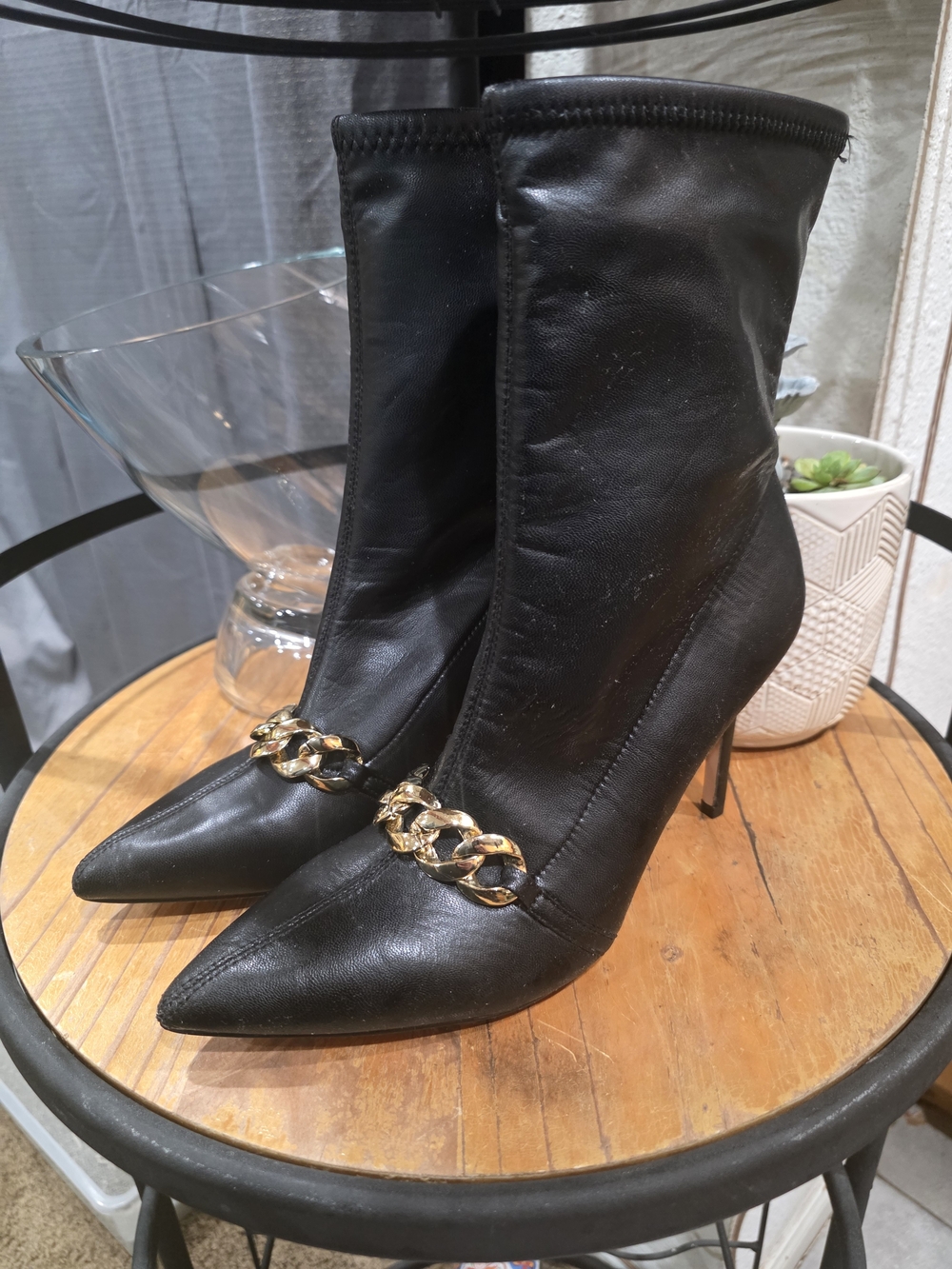 XOXO Black Pointed Stiletto Sock Boots with Gold Chain